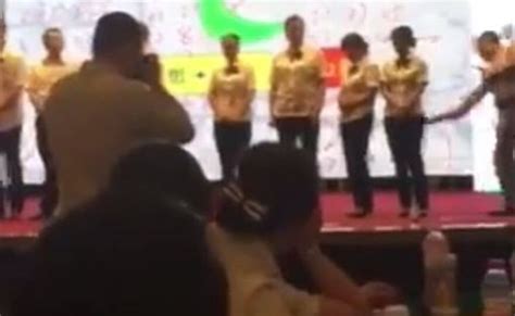 spanking bank|Video shows China bank employees being spanked .